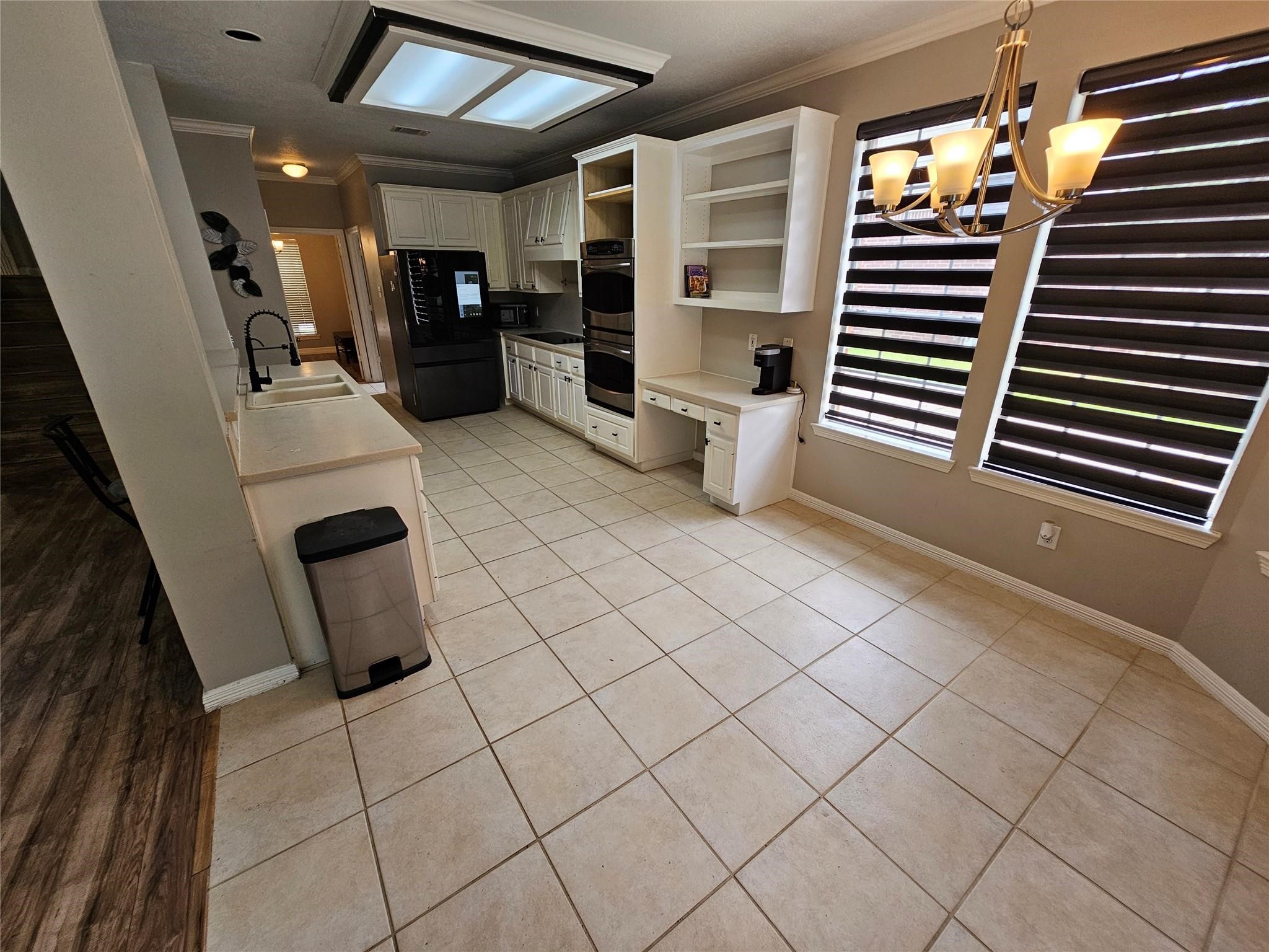 25606 Valley Springs Place Spring, TX 77373 - Photo 8 of 31 a view of an empty room with wooden floor