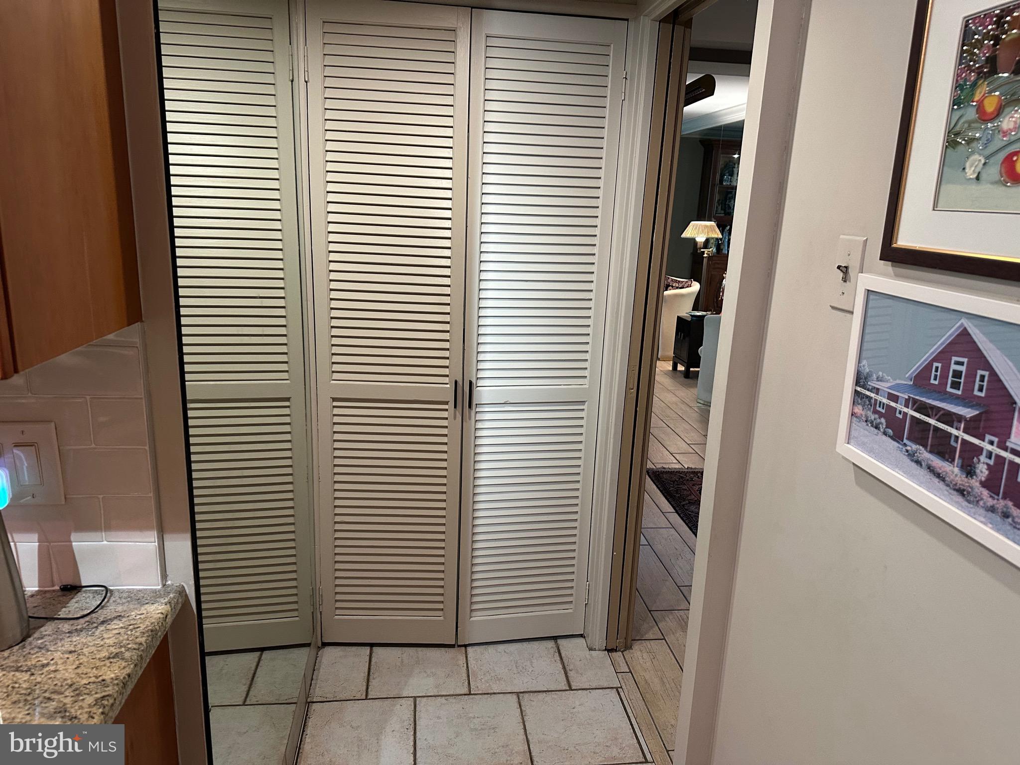 41 Conshohocken State Road, Unit 212 Bala Cynwyd, PA 19004 - Photo 12 of 33 closet in kitchen with 2nd refrigerator