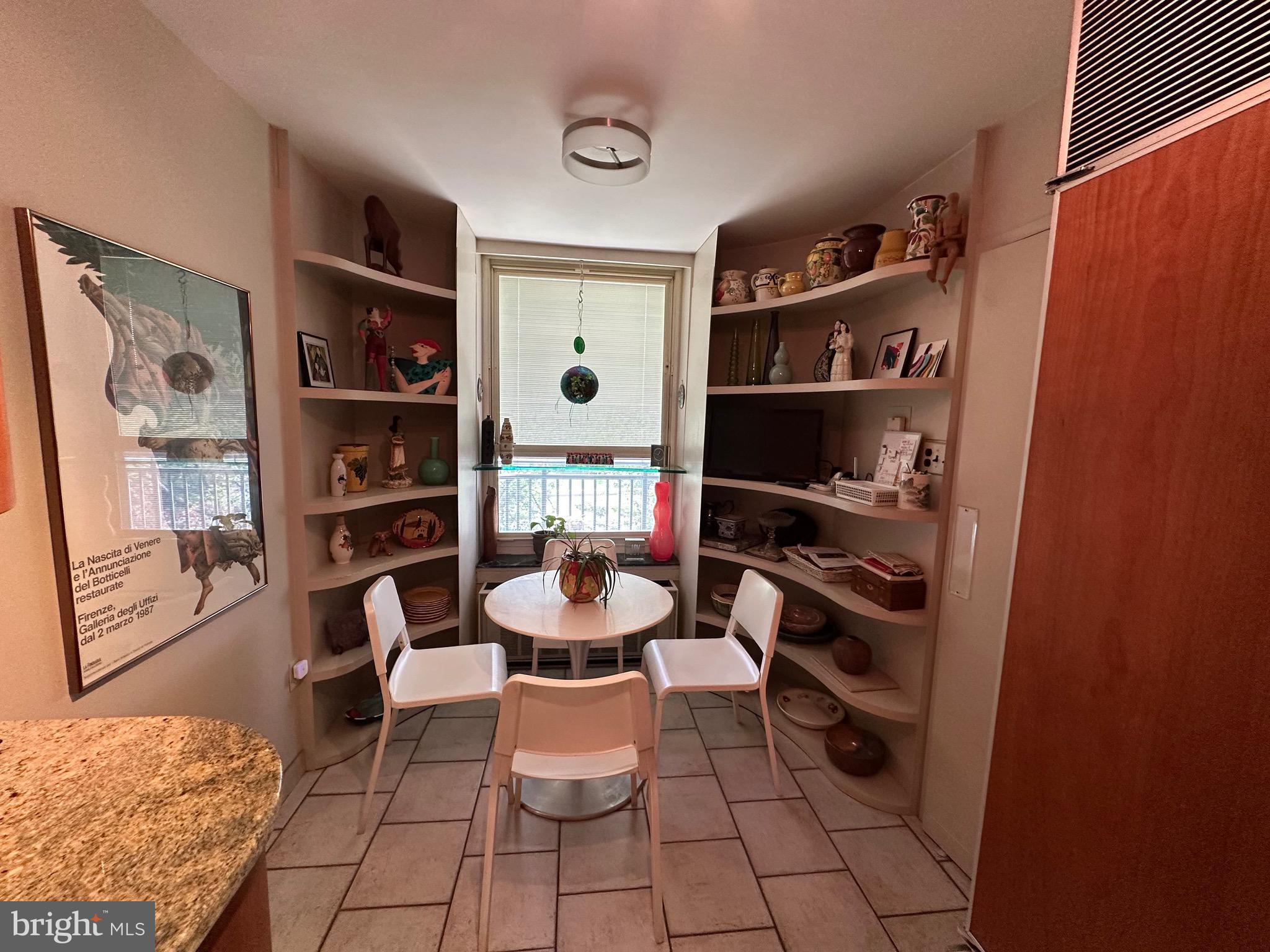 41 Conshohocken State Road, Unit 212 Bala Cynwyd, PA 19004 - Photo 10 of 33 eating area with bookcases