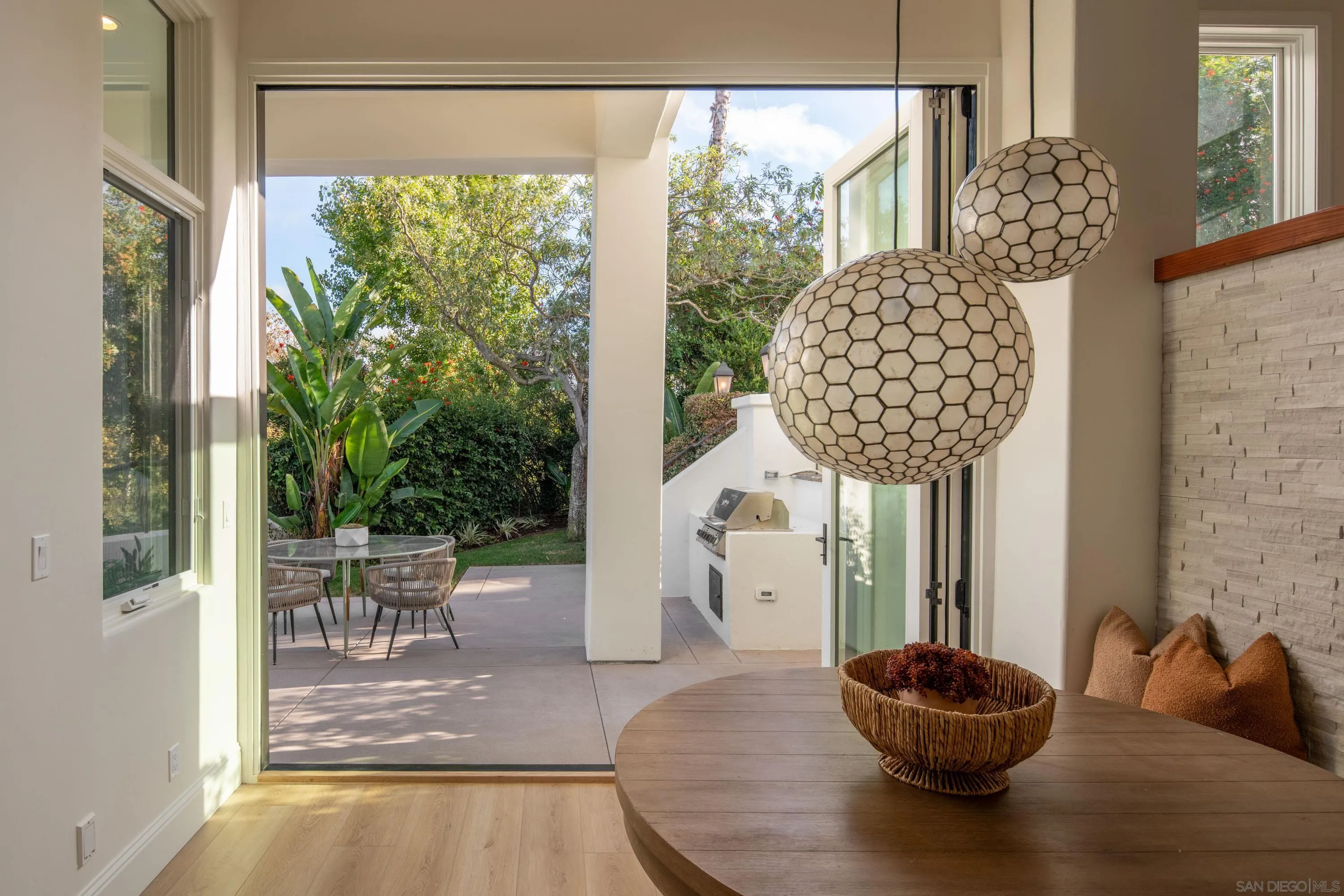 2815 Santa Fe Vista Court Encinitas, CA 92024 - Photo 13 of 74 a living room with patio furniture and a potted plant