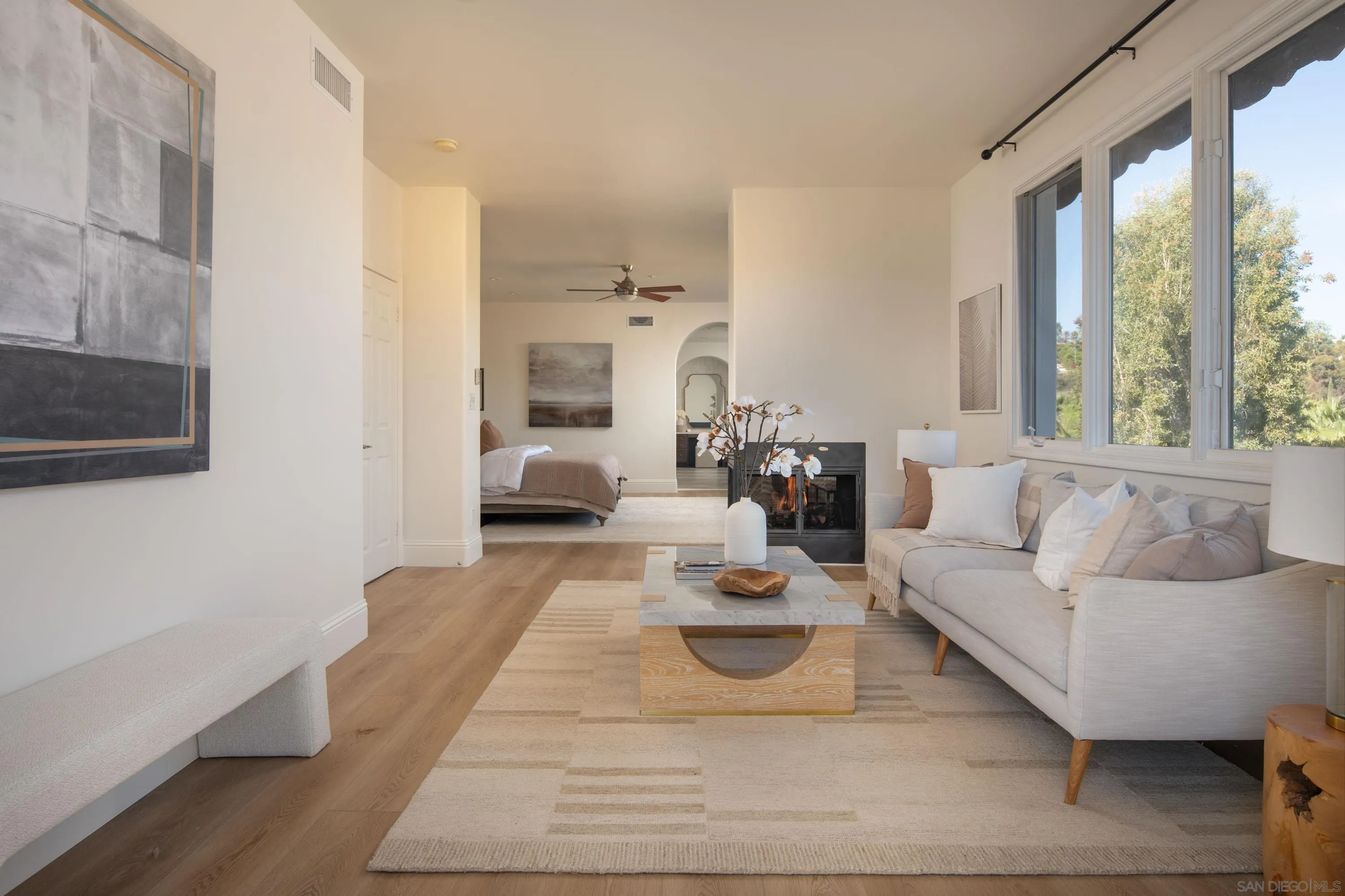 2815 Santa Fe Vista Court Encinitas, CA 92024 - Photo 34 of 74 a living room with furniture large window and a table