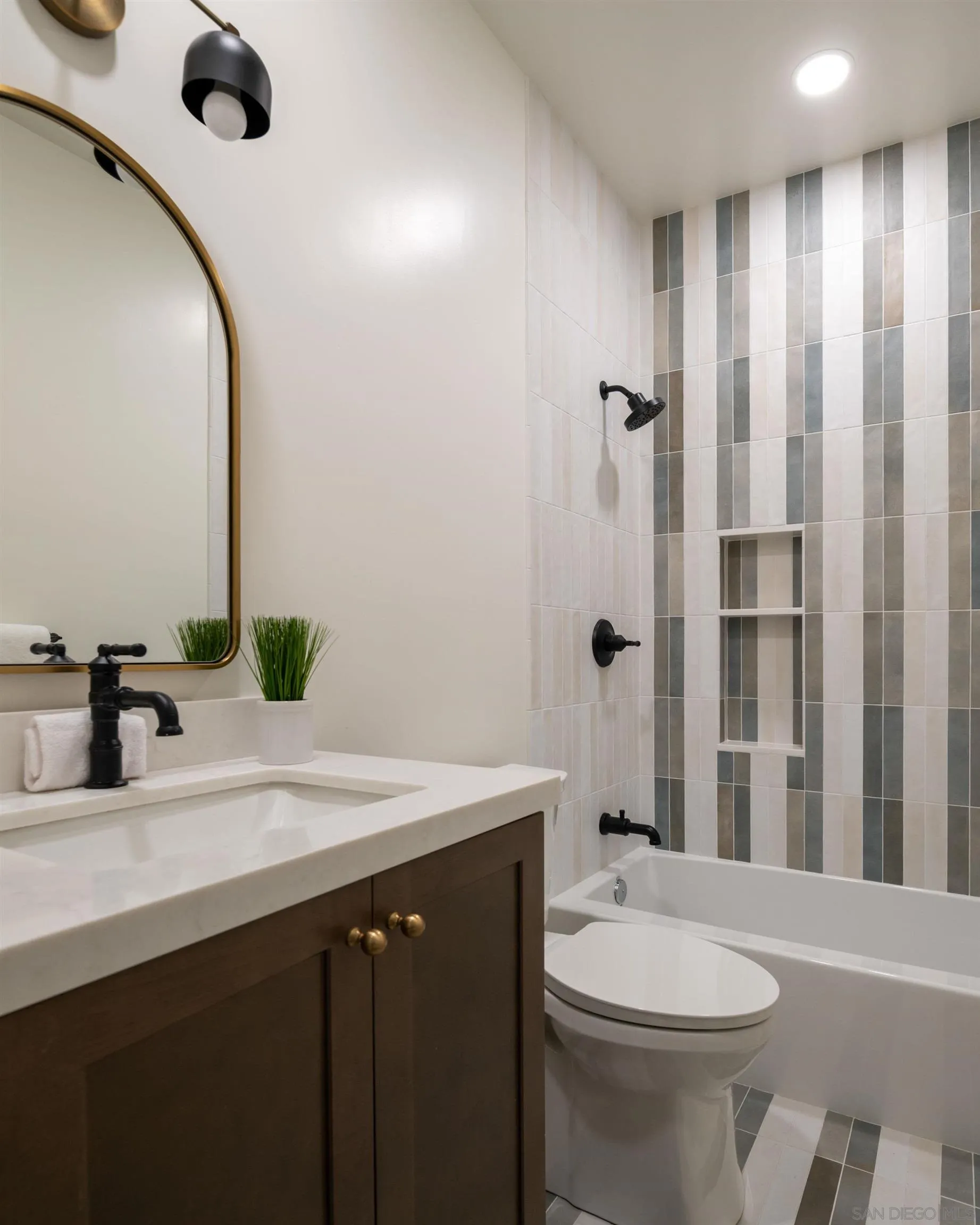 2815 Santa Fe Vista Court Encinitas, CA 92024 - Photo 41 of 74 a bathroom with a sink a toilet and shower