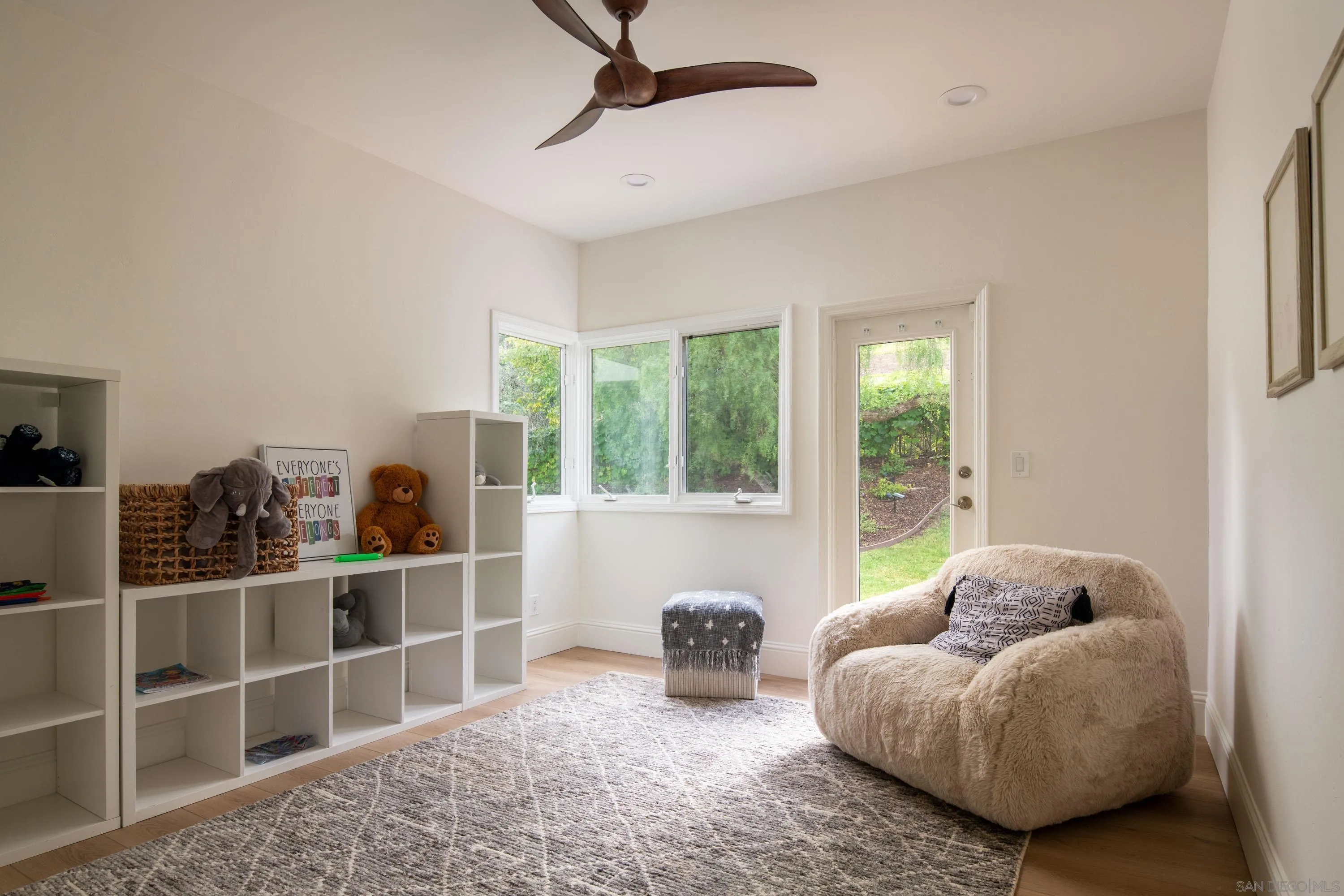 2815 Santa Fe Vista Court Encinitas, CA 92024 - Photo 43 of 74 a living room with furniture lamp and window