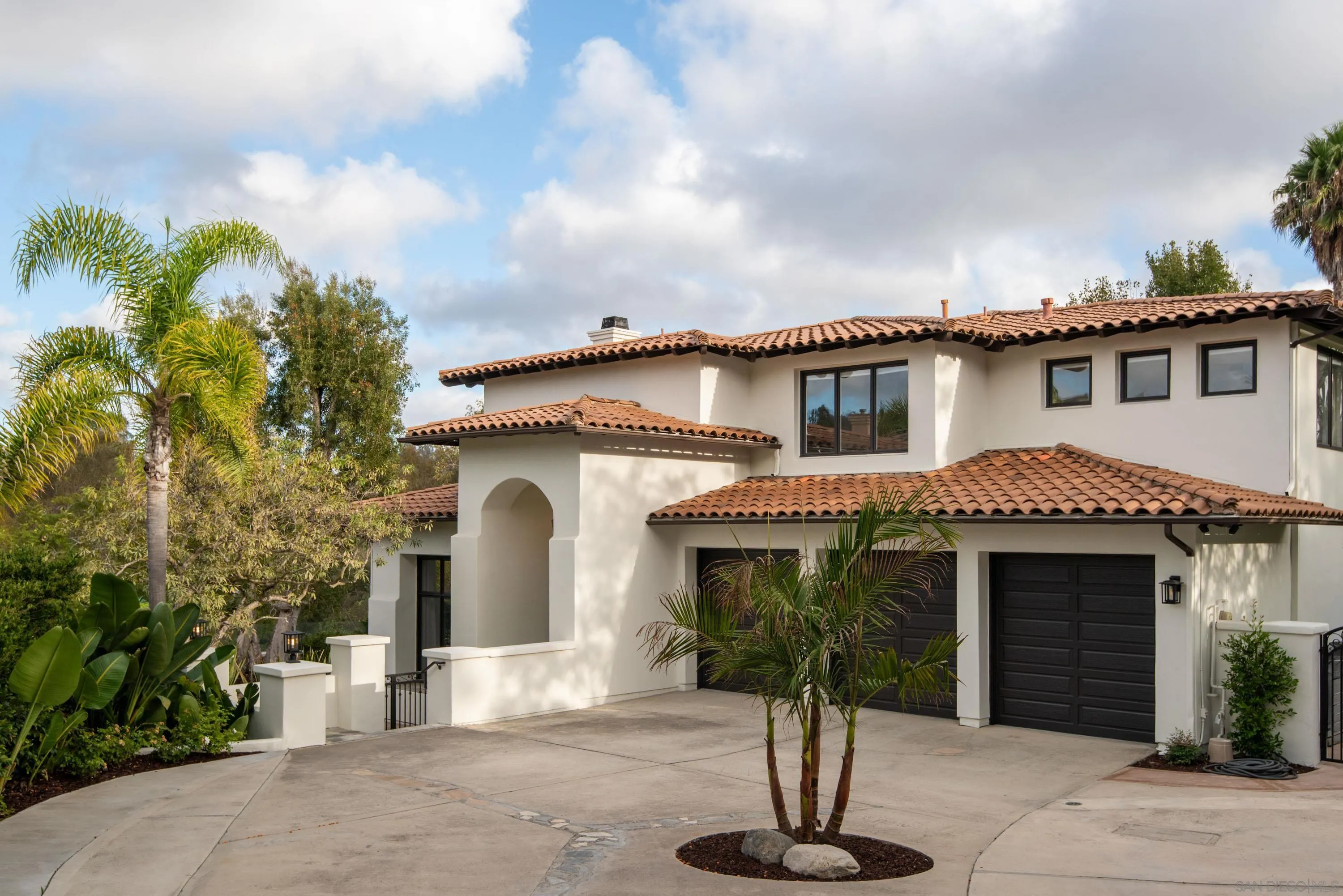 2815 Santa Fe Vista Court Encinitas, CA 92024 - Photo 67 of 74 a front view of a house with garden