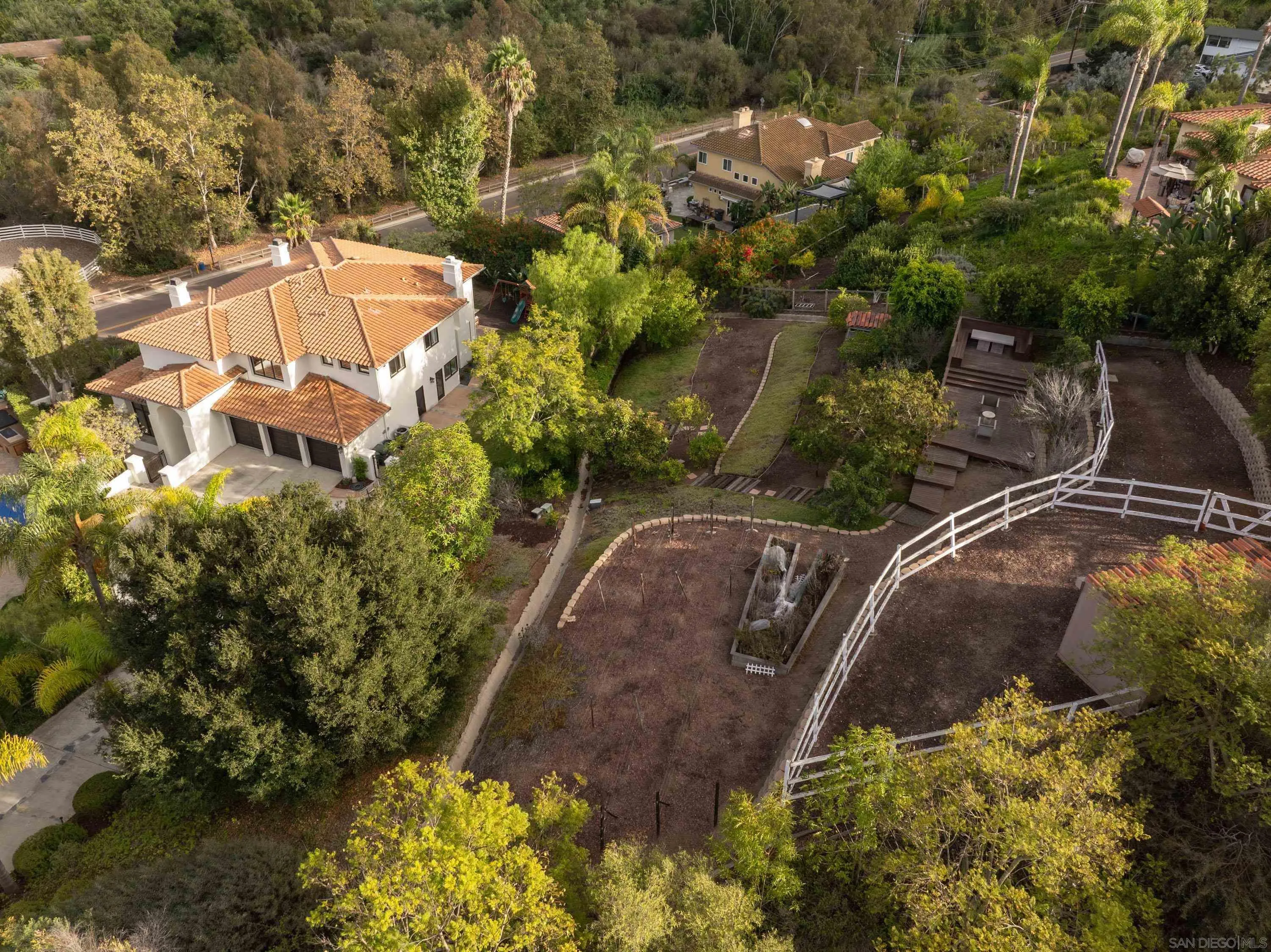 2815 Santa Fe Vista Court Encinitas, CA 92024 - Photo 73 of 74 an aerial view of a house with a yard and large trees