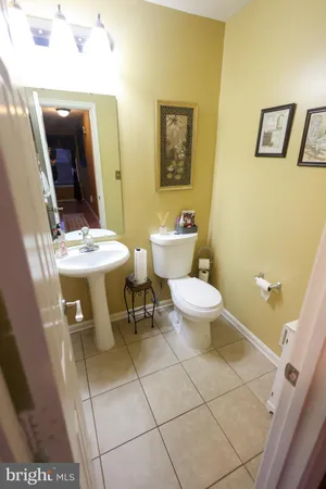 a bathroom with a toilet and a sink