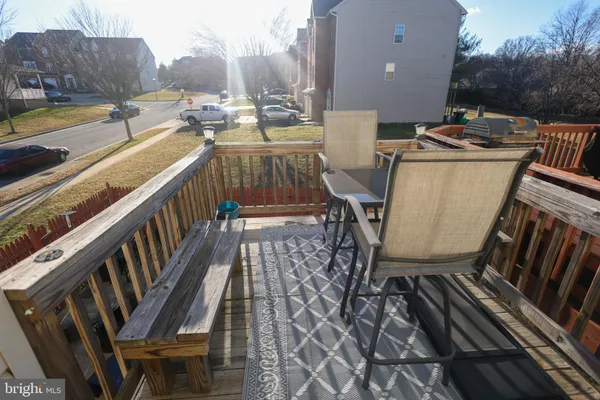 a view of a chairs and tables in the patio