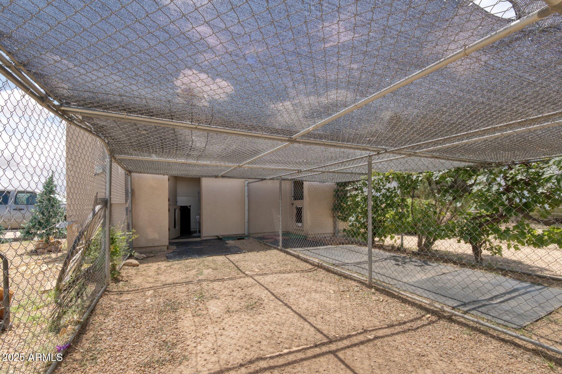 1426 South Foudy Road Bisbee, AZ 85603 - Photo 27 of 60 Dog runs - kennel entrance