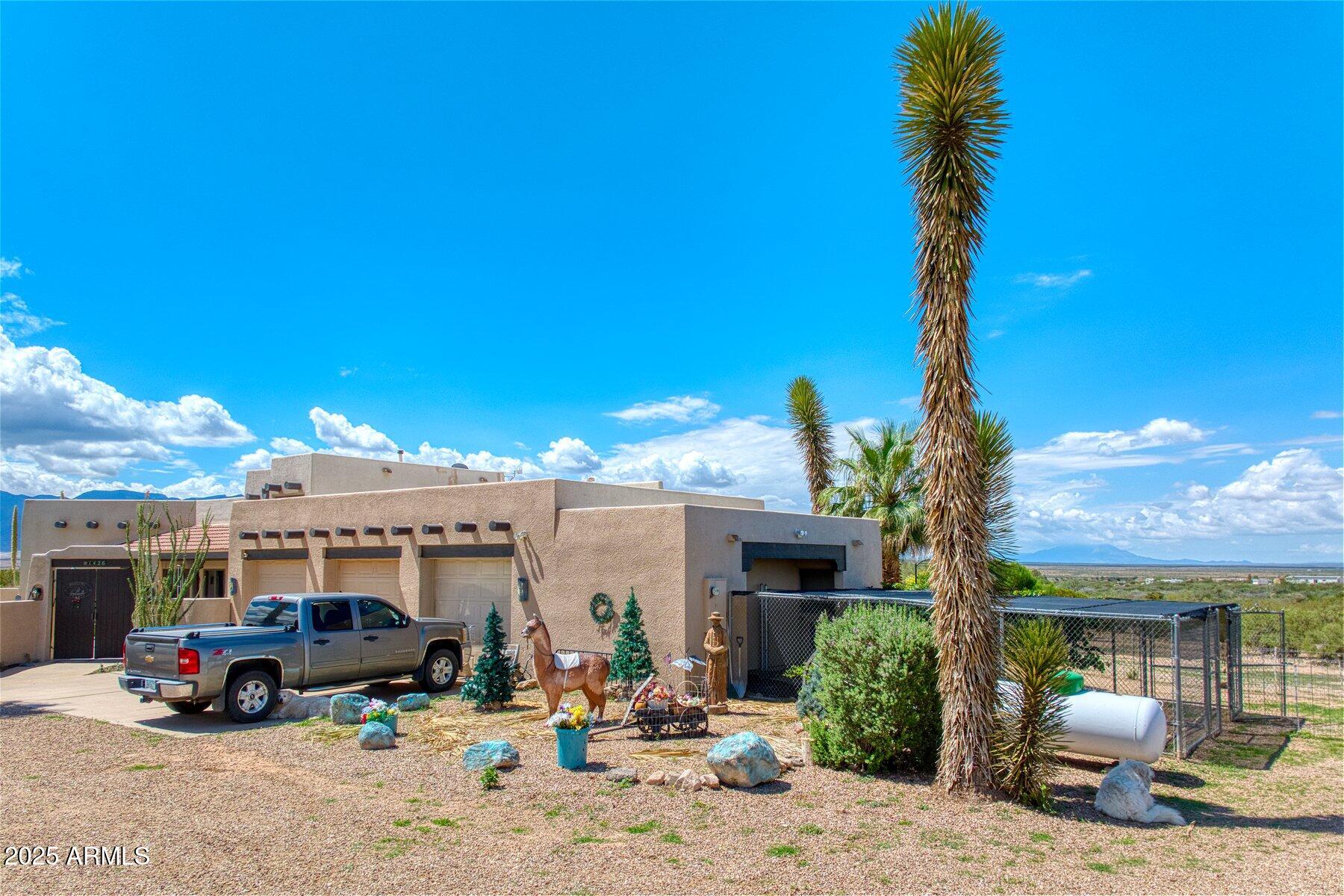 1426 South Foudy Road Bisbee, AZ 85603 - Photo 29 of 60 a car parked in front of a building