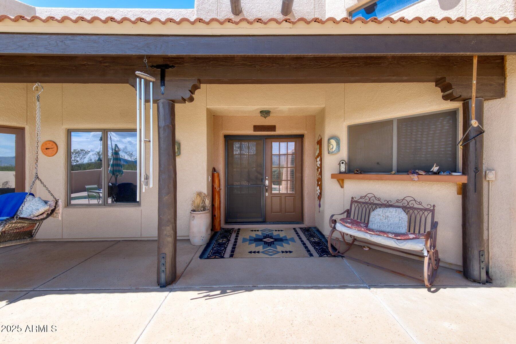 1426 South Foudy Road Bisbee, AZ 85603 - Photo 3 of 60 a room with furniture and window