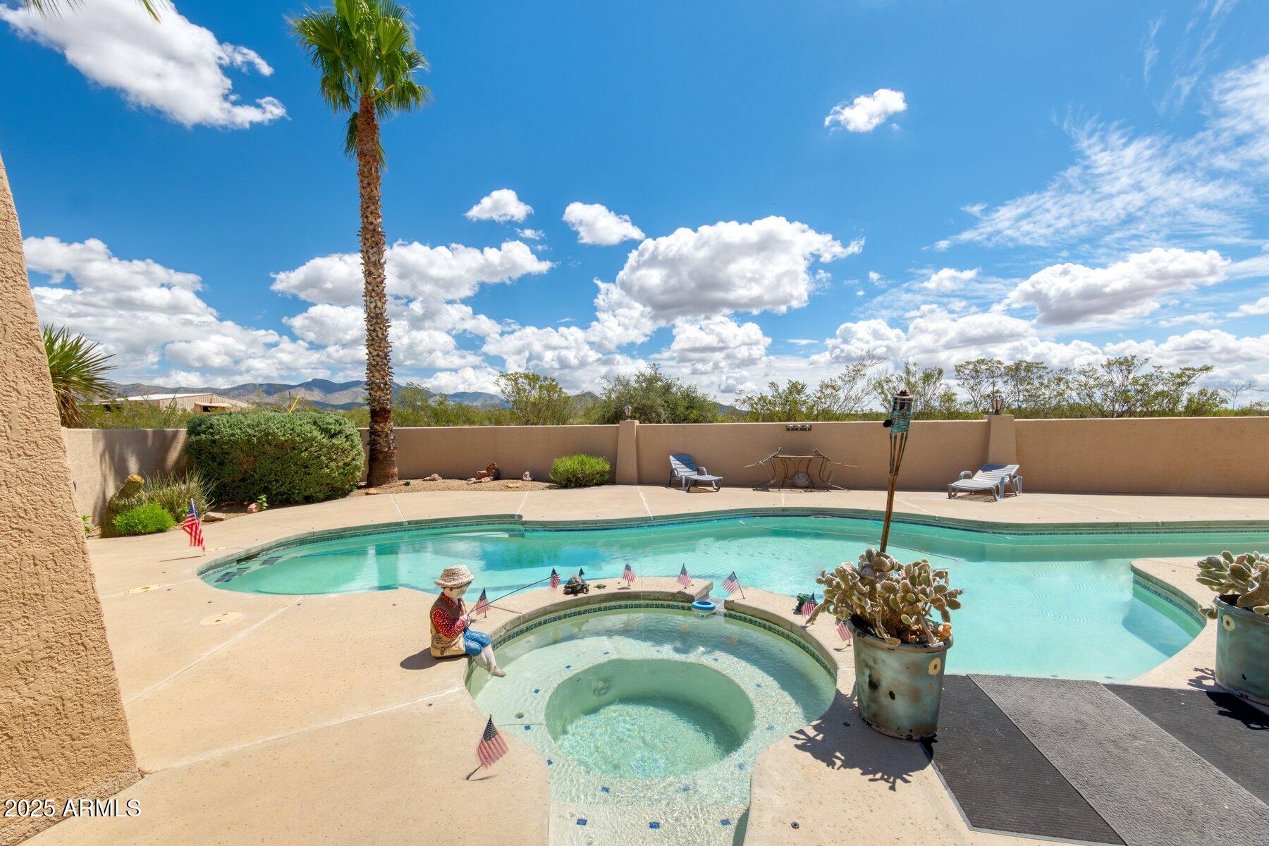 1426 South Foudy Road Bisbee, AZ 85603 - Photo 44 of 60 a view of a backyard with swimming pool