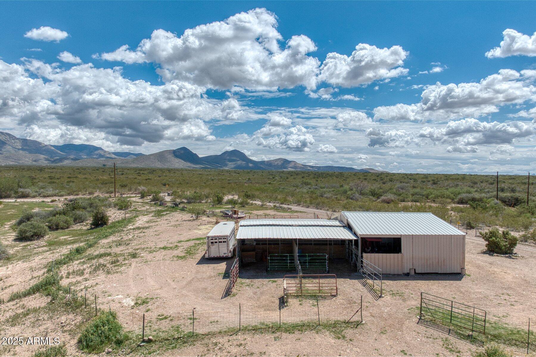 1426 South Foudy Road Bisbee, AZ 85603 - Photo 46 of 60 a view of a terrace with lawn chairs