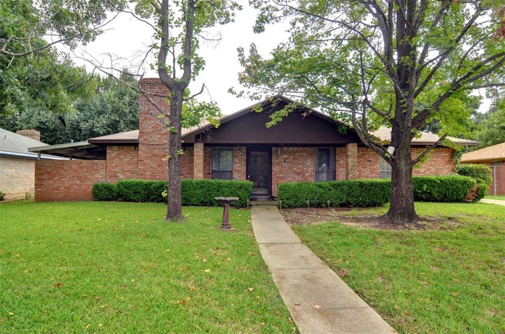 2728 Mill Pond Road Denton, TX 76209 - Photo 1 of 1 a front view of a house with a yard