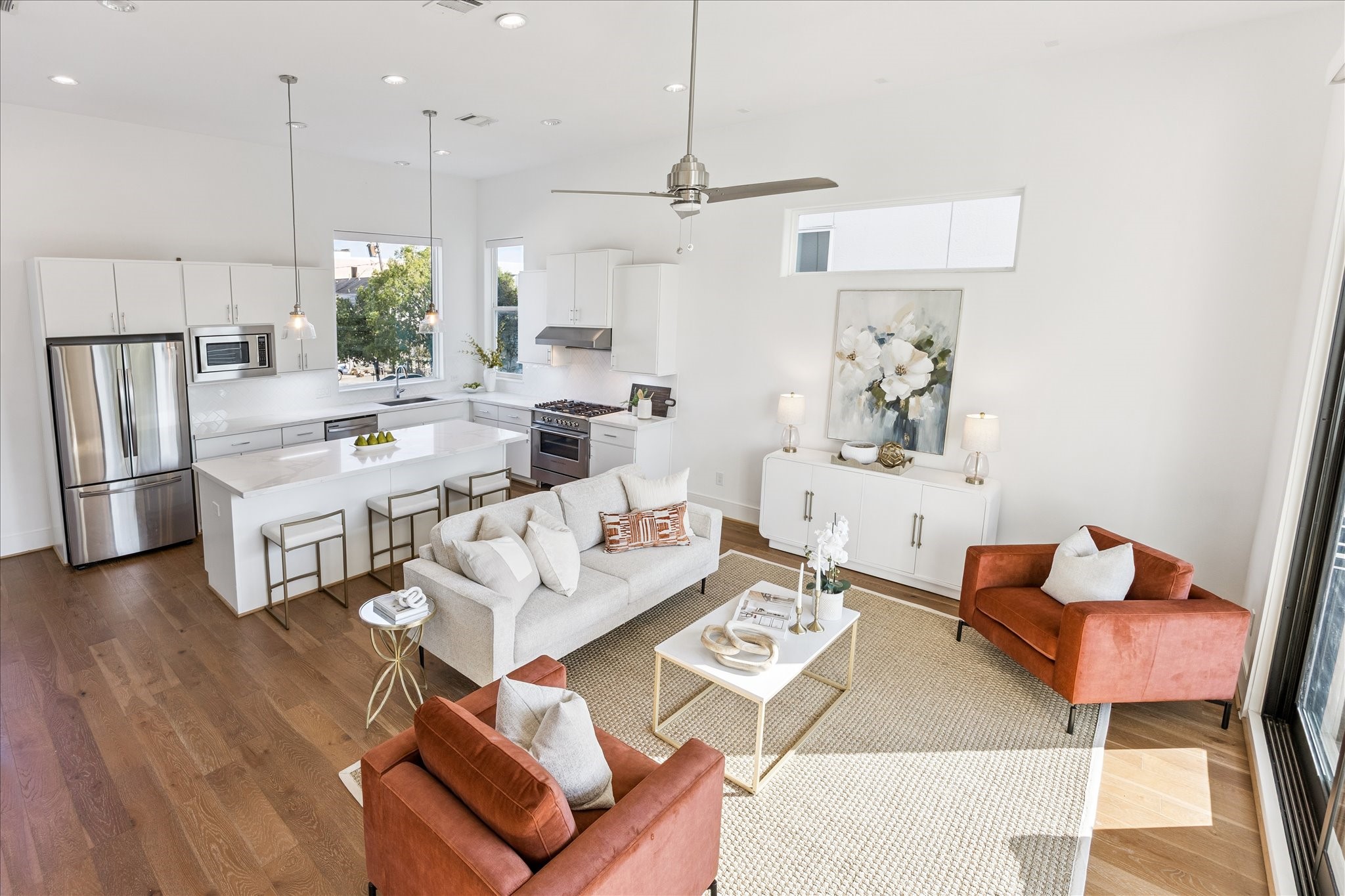2414 Canal Street, Unit F Houston, TX 77003 - Photo 18 of 34 a living room with lots of furniture and a wooden floor