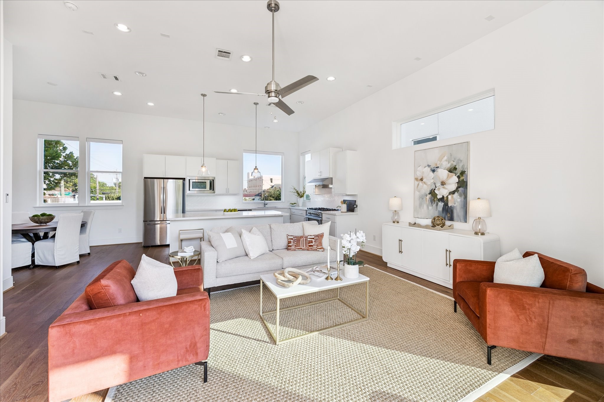 2414 Canal Street, Unit F Houston, TX 77003 - Photo 19 of 34 a living room with furniture and a chandelier