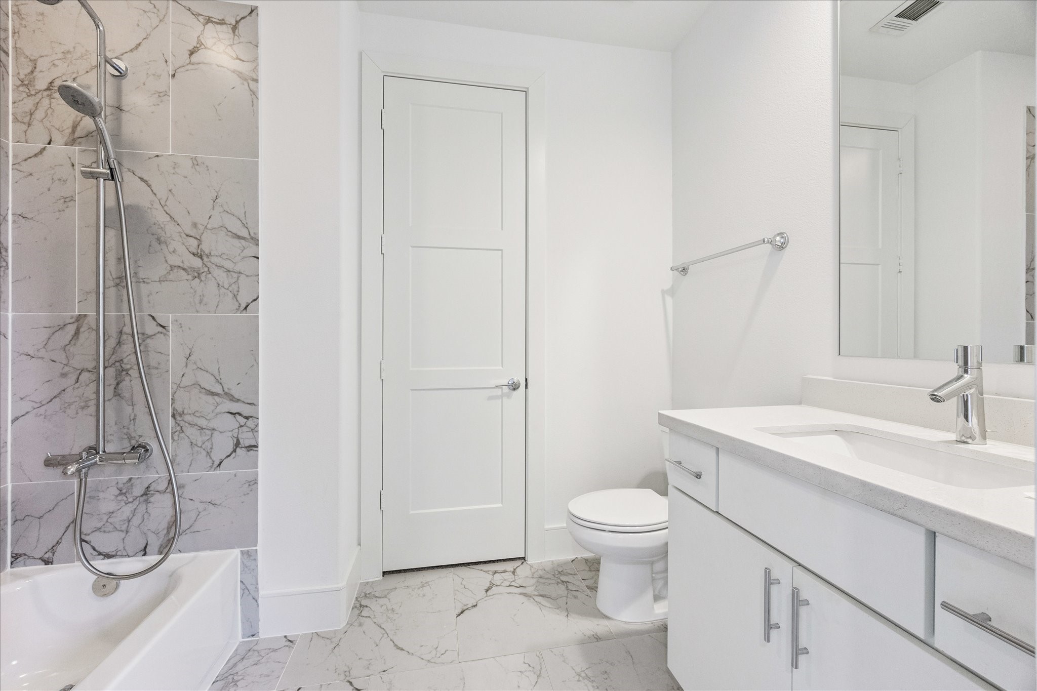 2414 Canal Street, Unit F Houston, TX 77003 - Photo 29 of 34 a bathroom with a granite countertop sink a toilet and shower