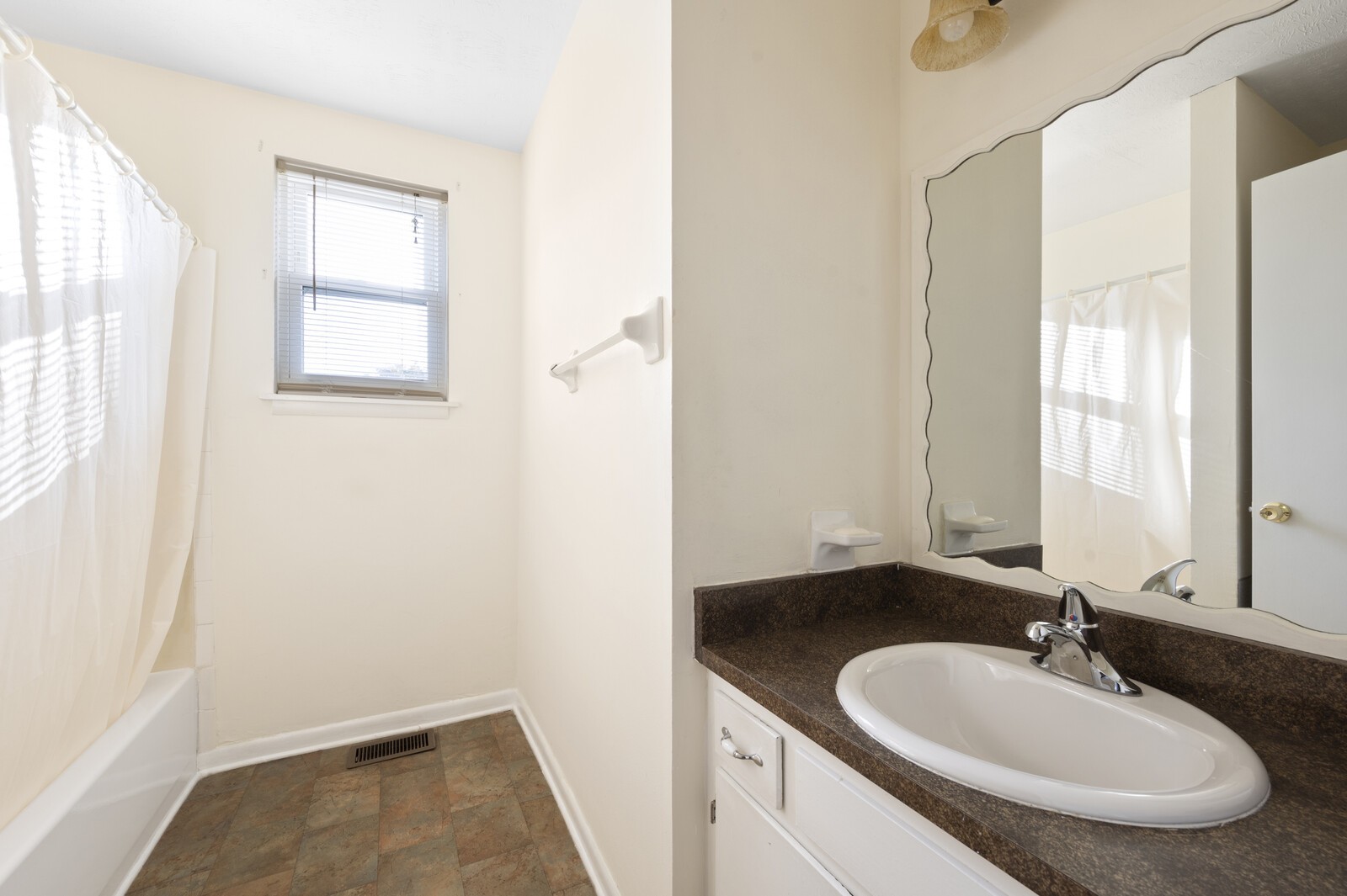 2911 Anderson Road Nashville, TN 37217 - Photo 9 of 14 a bathroom with a sink and a mirror