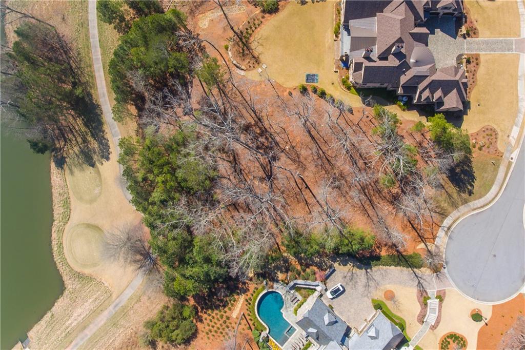 4921 Roaring Fork Pass Suwanee, GA 30024 - Photo 7 of 9 an aerial view of garden with swimming pool