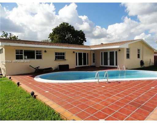9261 Southwest 88th Terrace Miami, FL 33173 - Photo 15 of 16 a house view with a backyard space