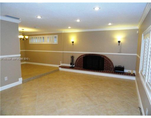 9261 Southwest 88th Terrace Miami, FL 33173 - Photo 2 of 16 a view of a indoor basketball court