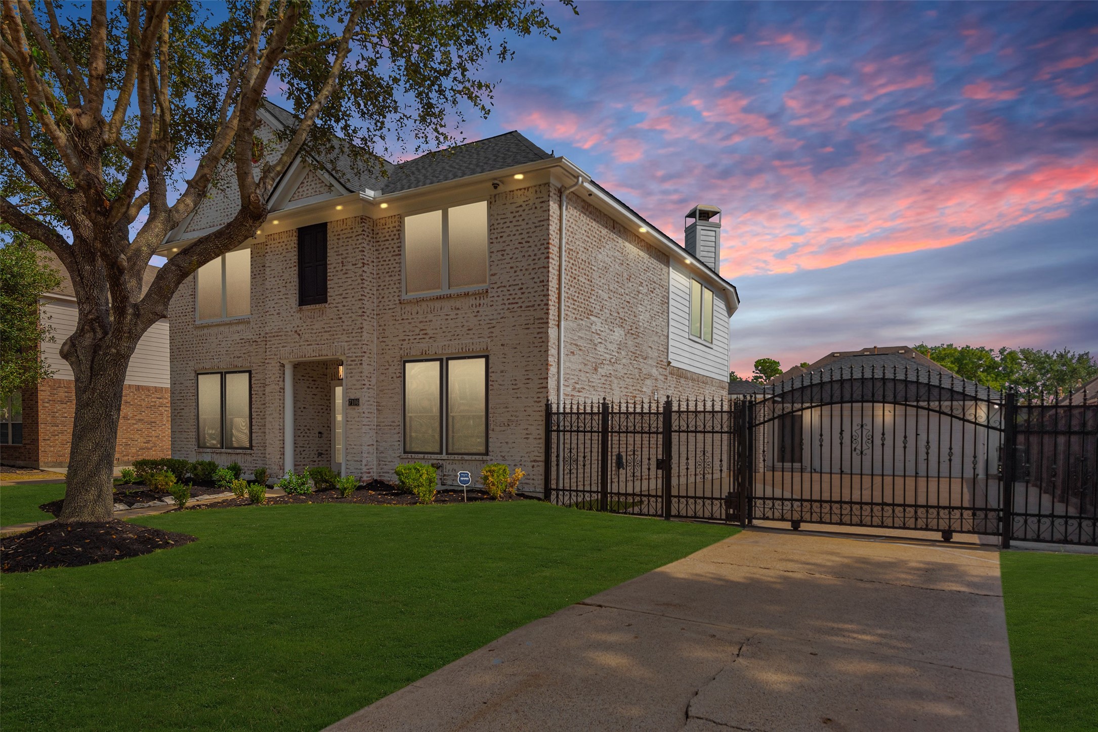a backyard of a house with lots of green space