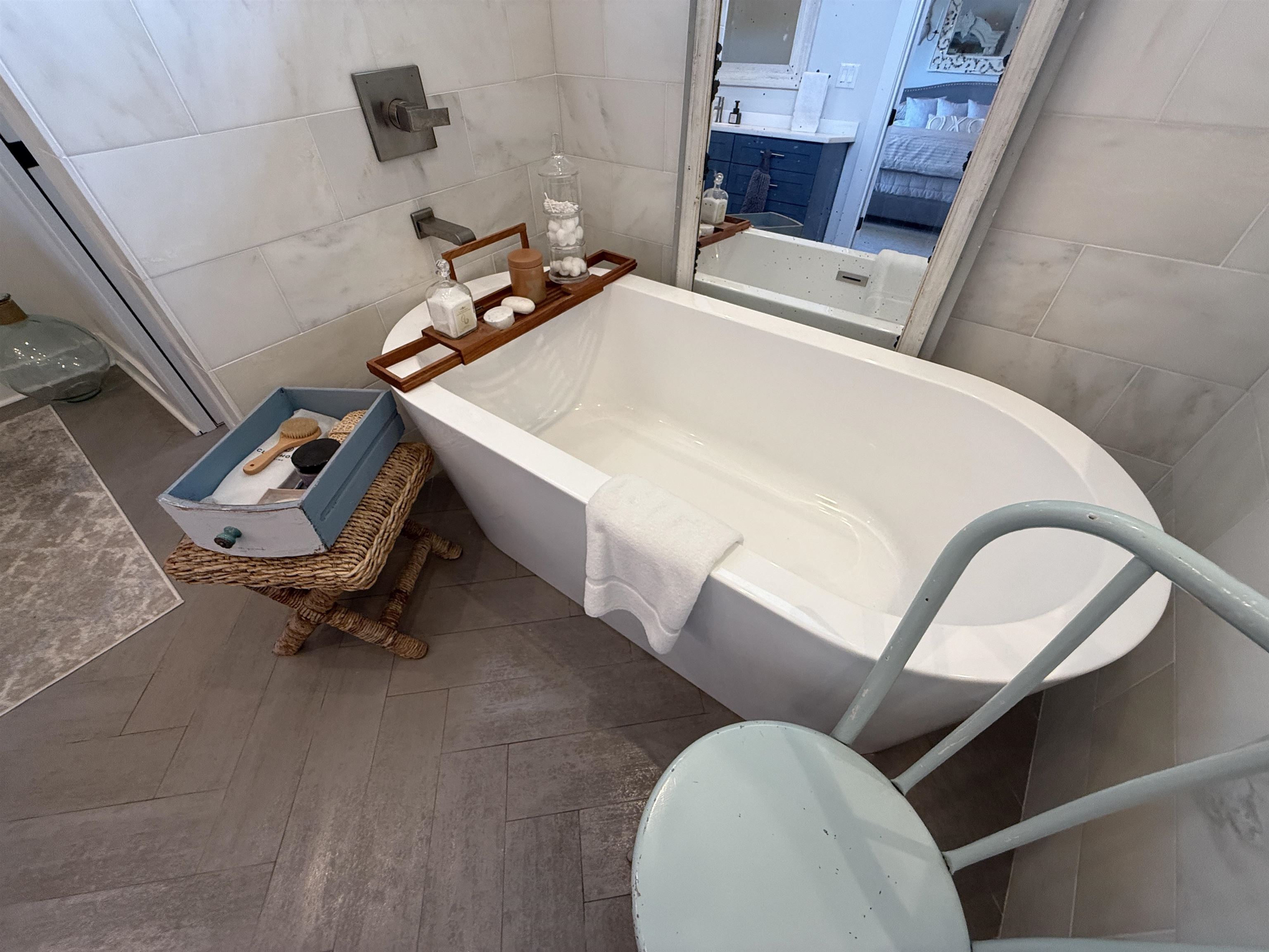 6900 Salem Road Lakeland, TN 38002 - Photo 25 of 40 Bathroom with tile walls, ensuite bathroom, a freestanding tub, and vanity