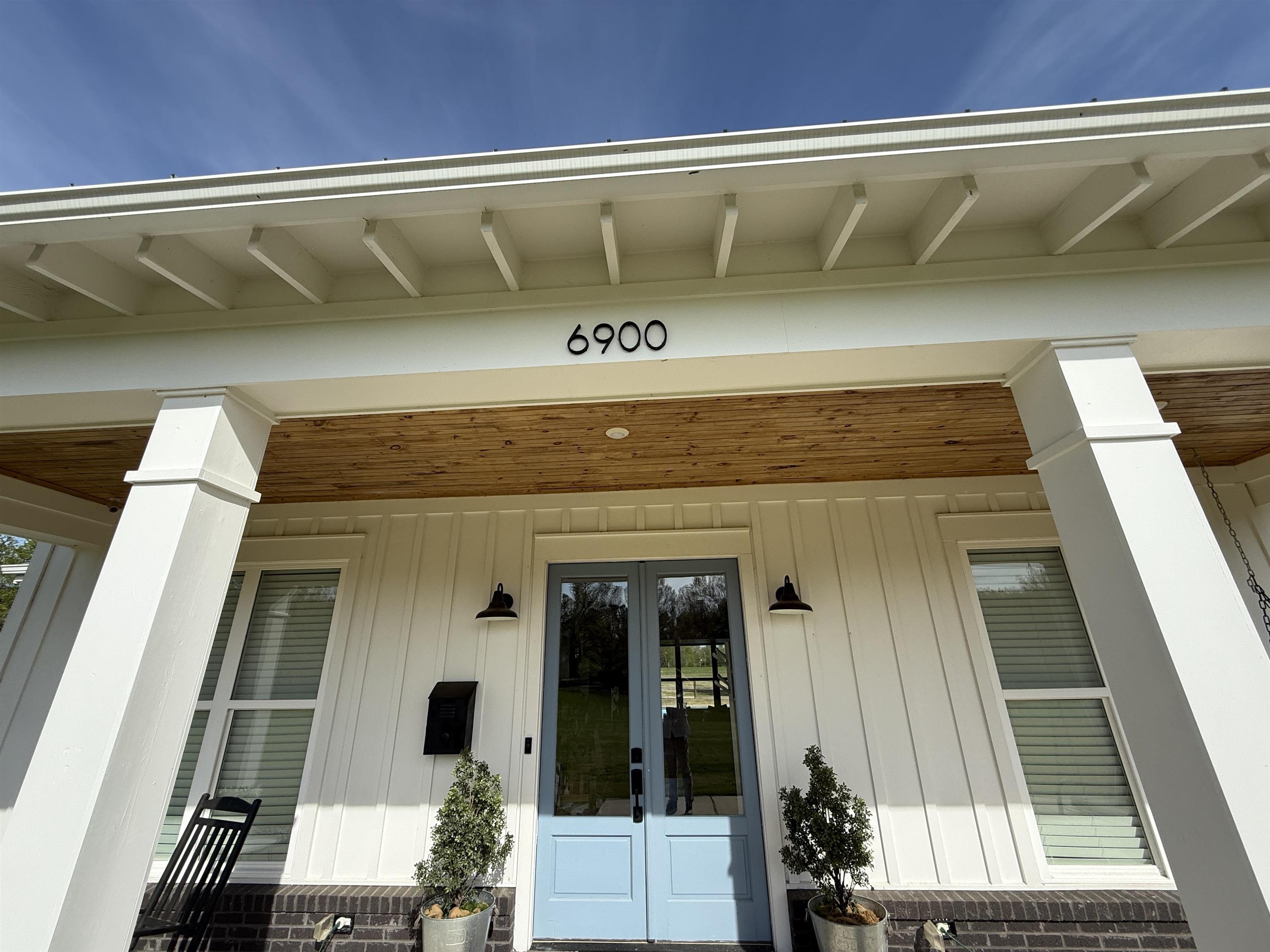 6900 Salem Road Lakeland, TN 38002 - Photo 6 of 40 Doorway to property featuring a porch and french doors