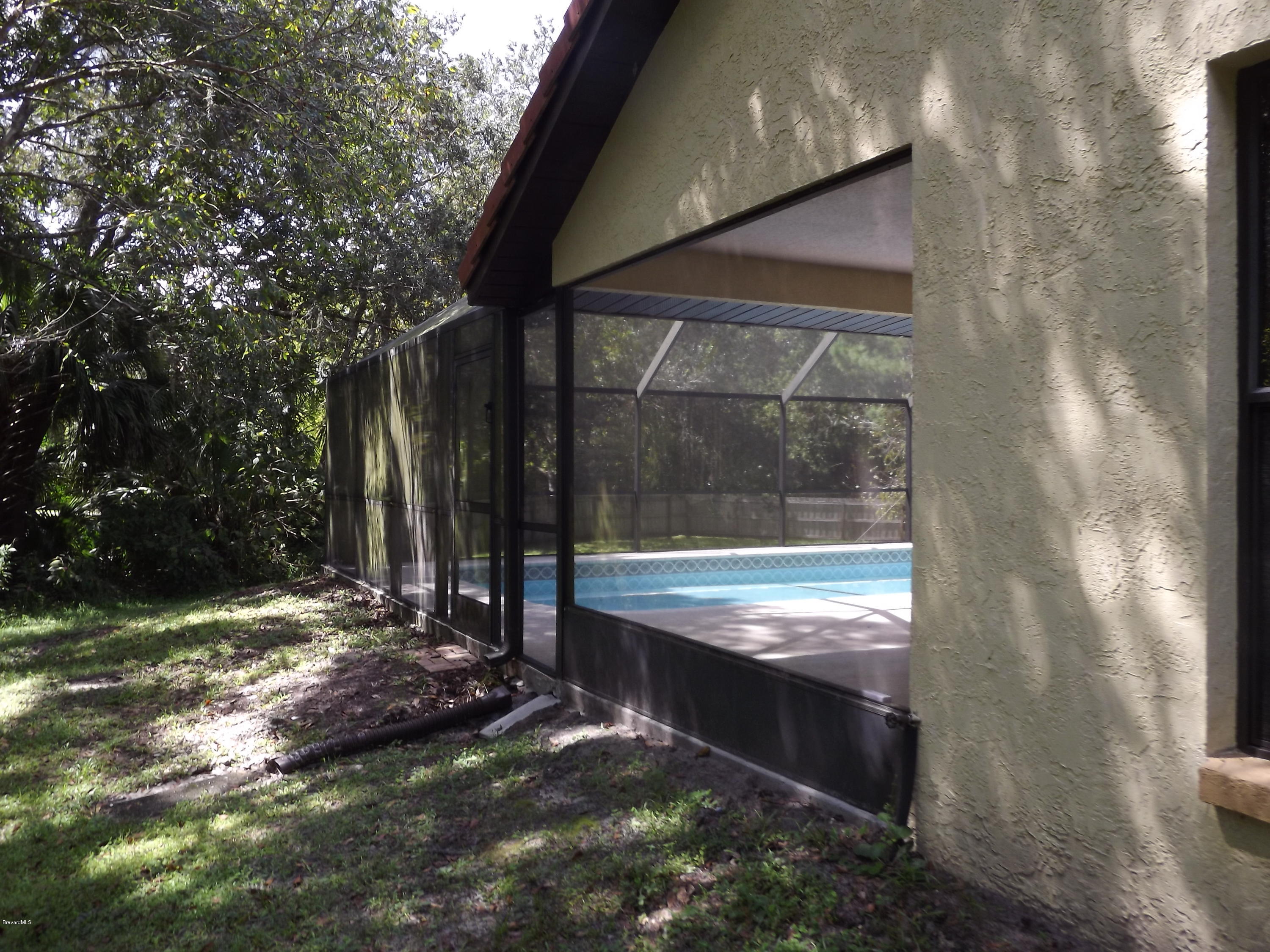 2241 Canal Ridge Drive Titusville, FL 32780 - Photo 36 of 39 Side View of Pool