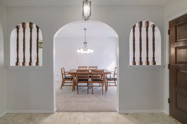 a view of a dining room with furniture