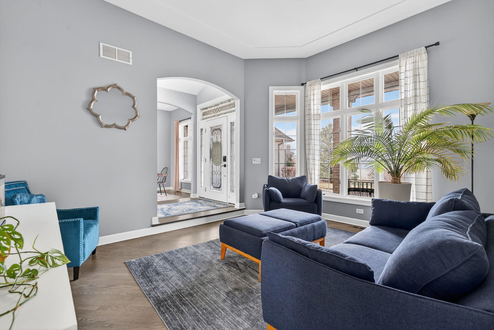 2804 Ninovan Lane Minooka, IL 60447 - Photo 14 of 67 a living room with furniture potted plant and a large window