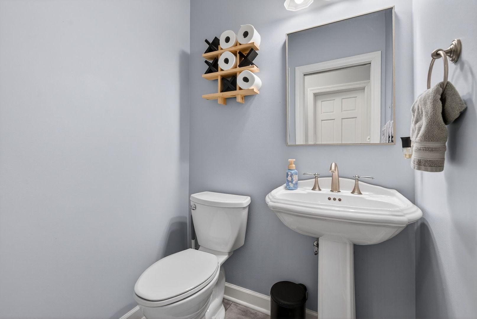 2804 Ninovan Lane Minooka, IL 60447 - Photo 38 of 67 a bathroom with a toilet sink and mirror