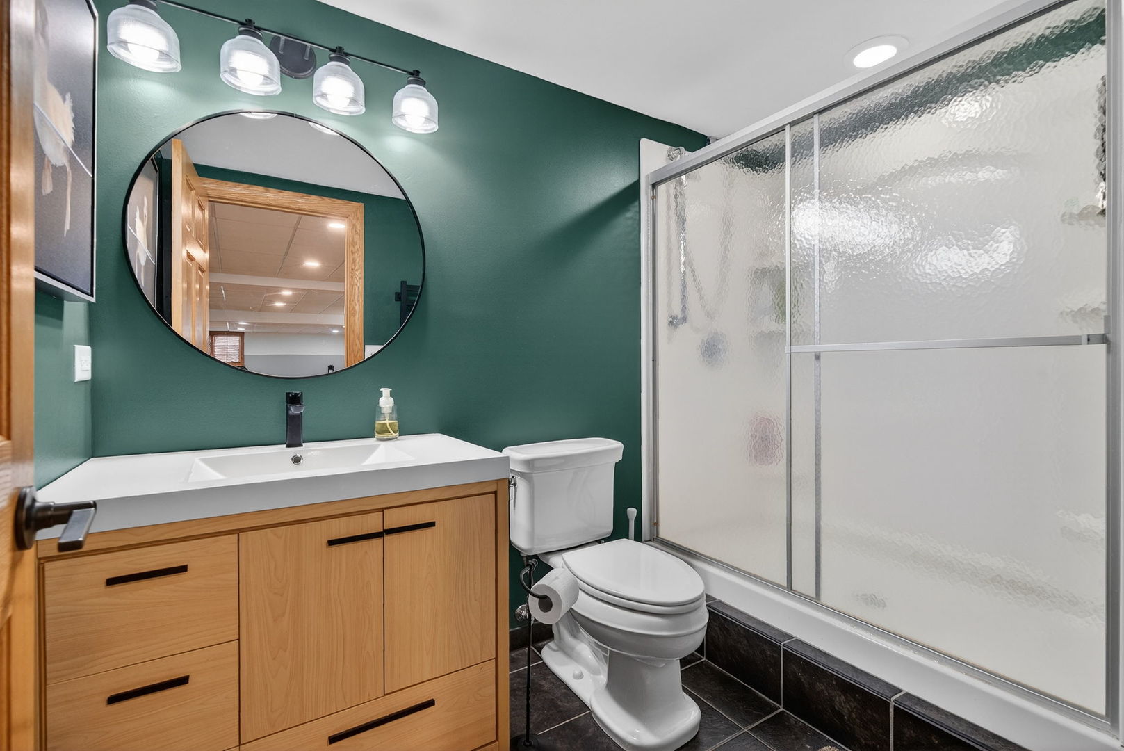 2804 Ninovan Lane Minooka, IL 60447 - Photo 51 of 67 a bathroom with a toilet a sink and mirror