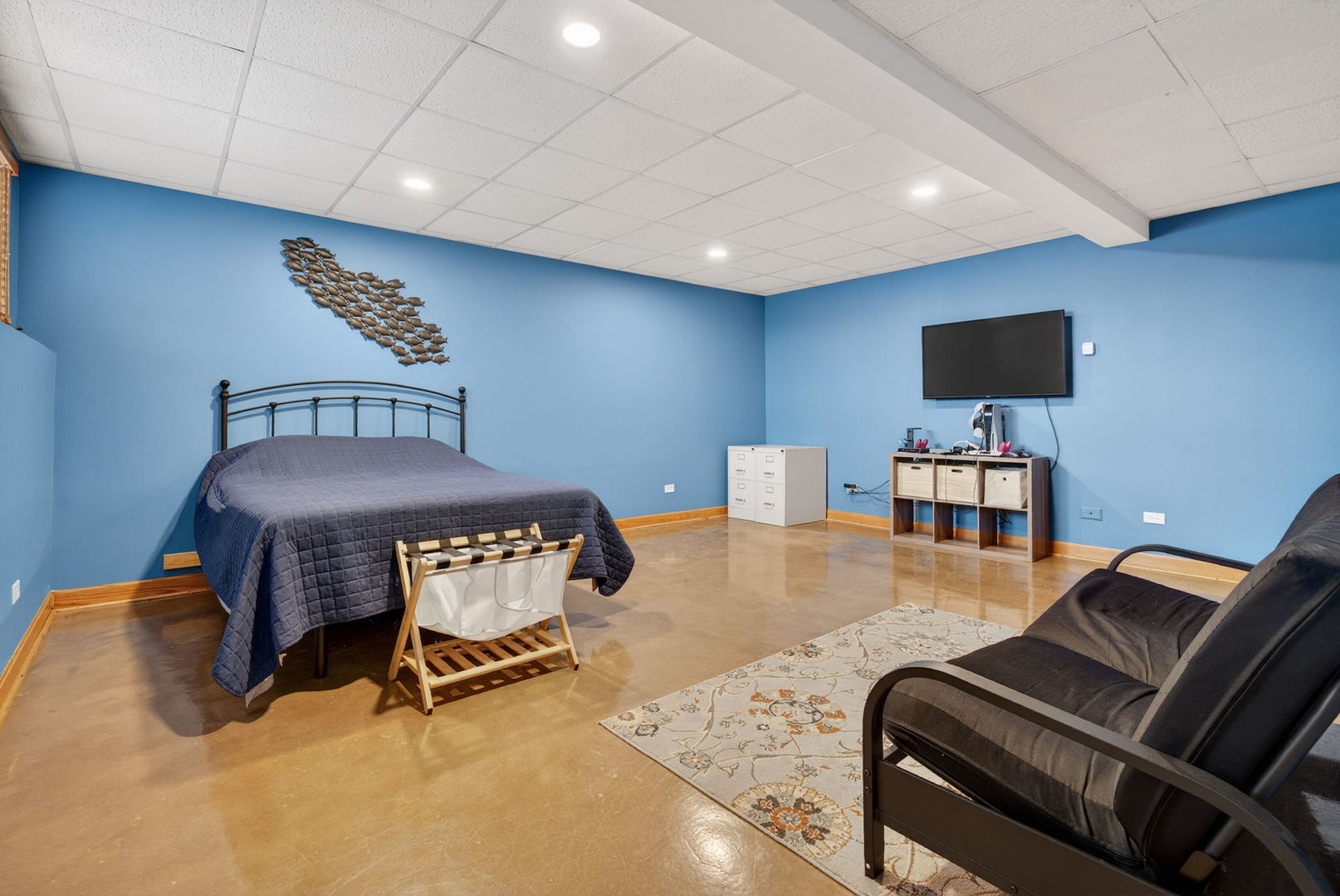 2804 Ninovan Lane Minooka, IL 60447 - Photo 54 of 67 a room with furniture and a flat screen tv