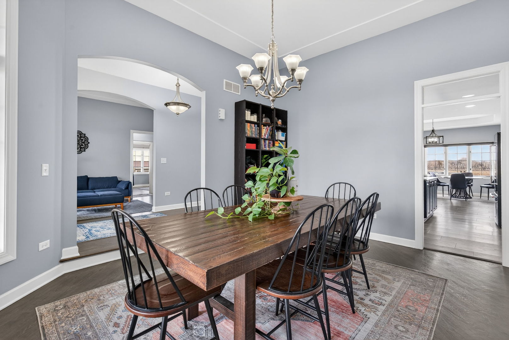 2804 Ninovan Lane Minooka, IL 60447 - Photo 9 of 67 a view of a dining room with furniture and wooden floor