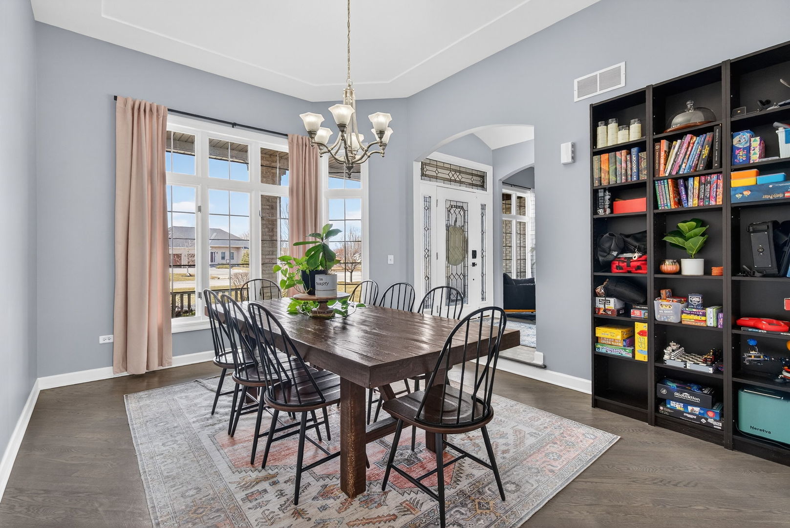 2804 Ninovan Lane Minooka, IL 60447 - Photo 10 of 67 a view of a dining room with furniture and a chandelier