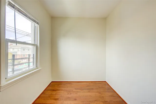 a view of an empty room and window