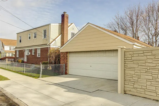 a view of a house with a garage