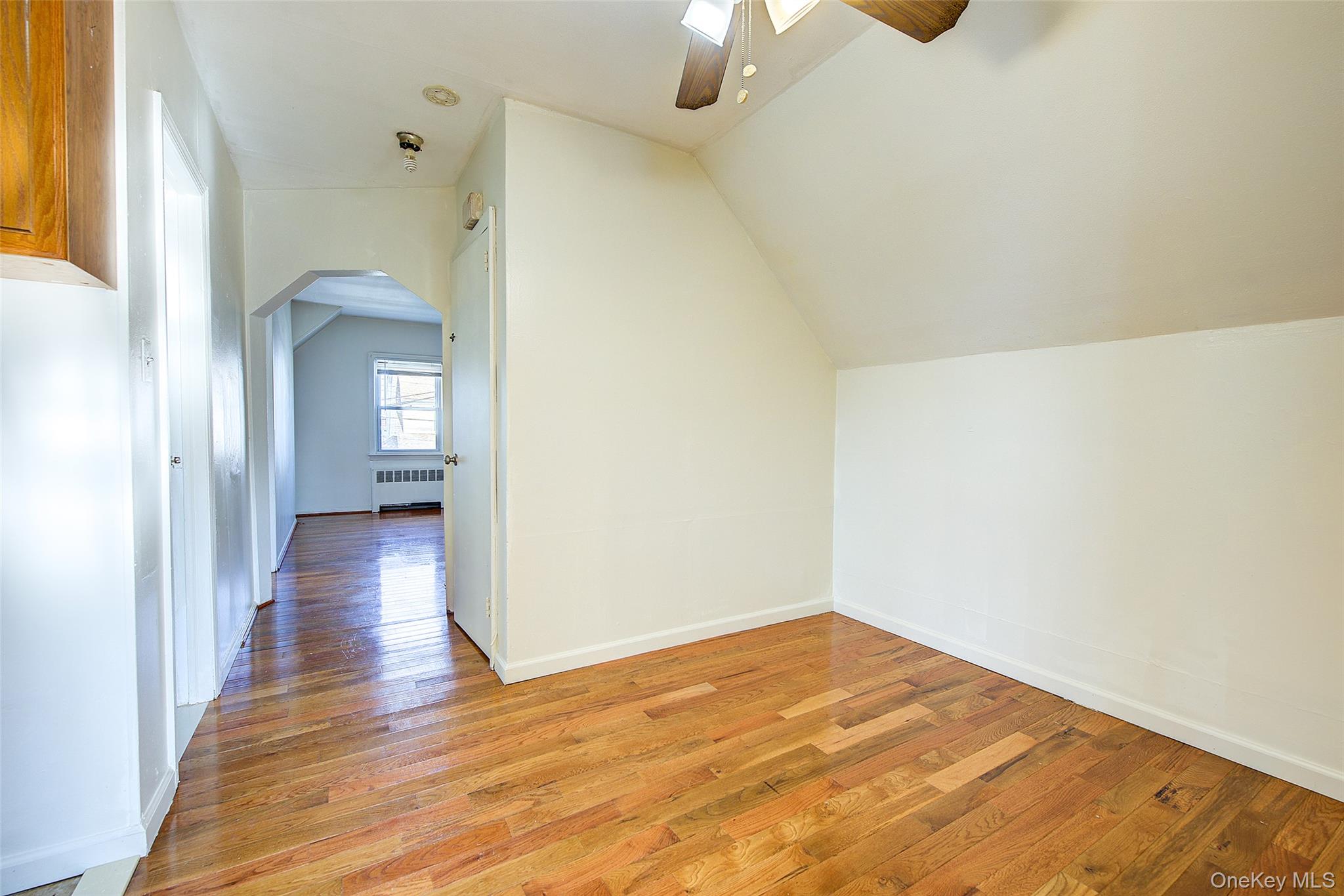 220-04 103rd Avenue Queens, NY 11429 - Photo 25 of 35 a view of a hallway with wooden floor