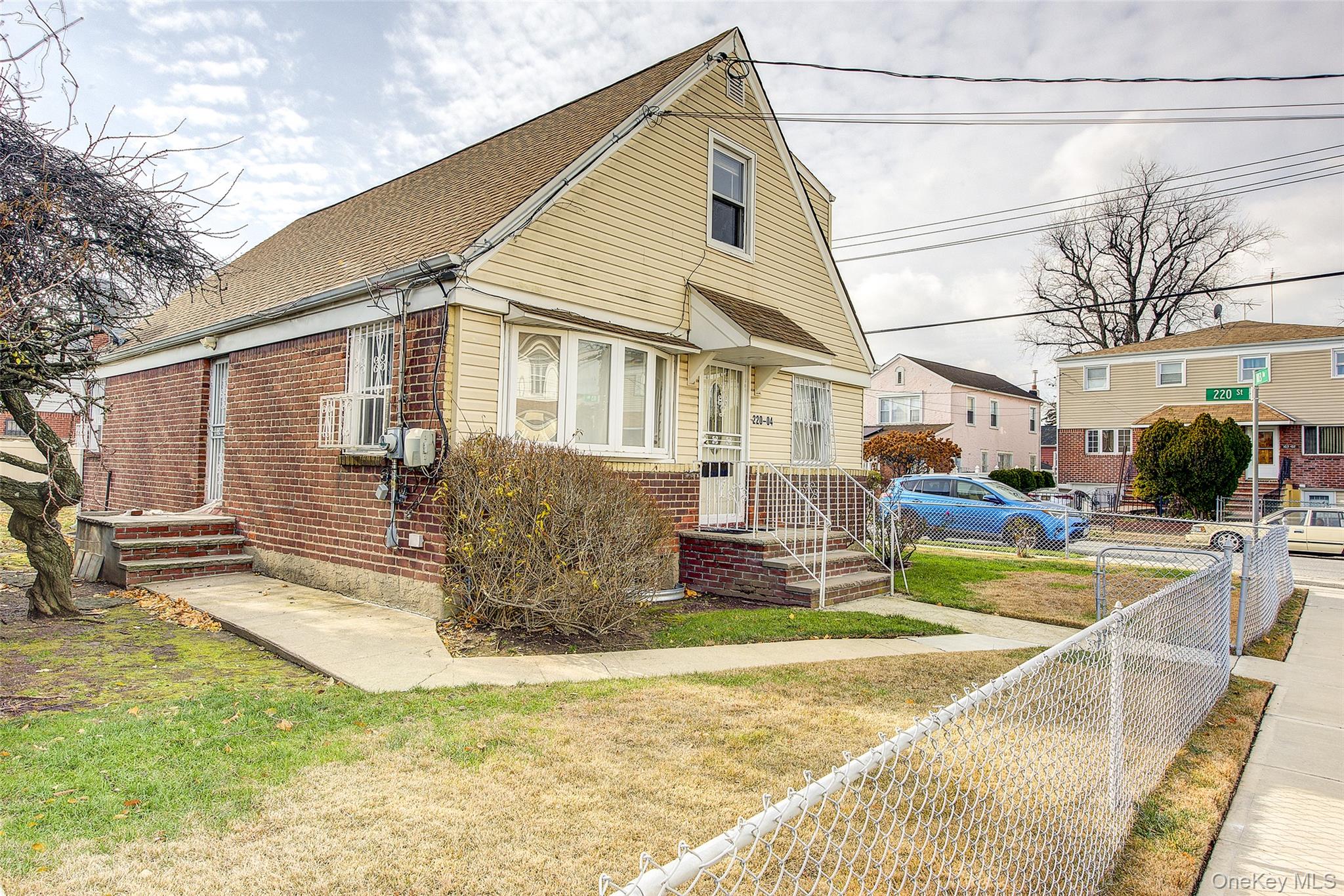 220-04 103rd Avenue Queens, NY 11429 - Photo 4 of 35 a front view of a house with swimming pool