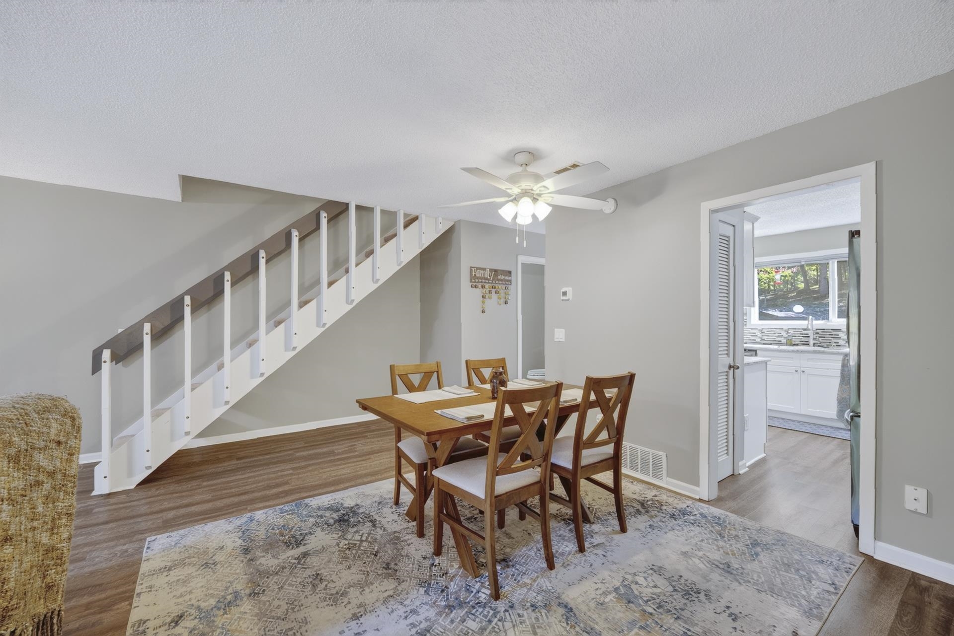 74 Driftwood Road Counce, TN 38326 - Photo 16 of 40 Interior room featuring wood-finish flooring, light gray wall paint, and white trim