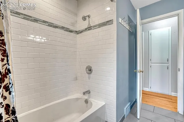 a bathroom with a bathtub