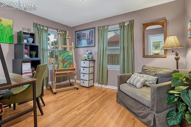 a living room with furniture and a window