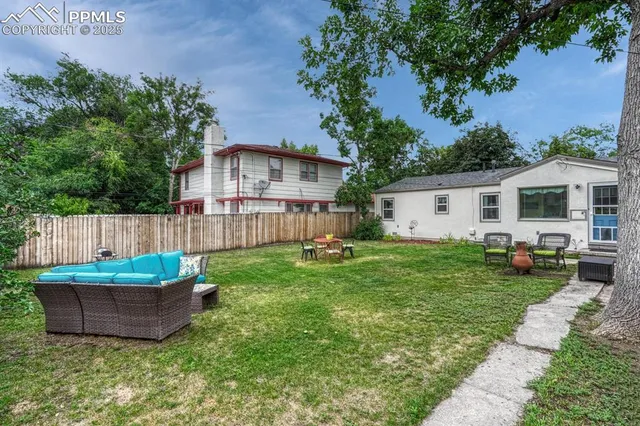 a backyard of a house and deck