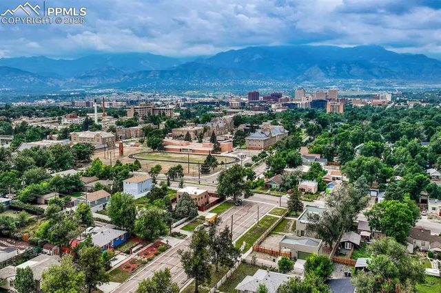 an aerial view of a city with lots of residential buildings