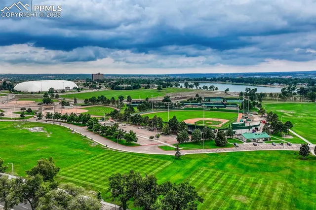 an aerial view of a house with a garden