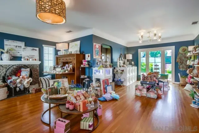 a living room with furniture and a table