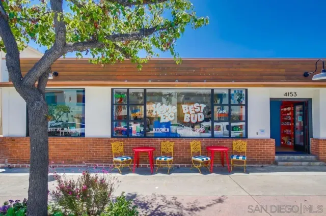 a view of a building with sitting area