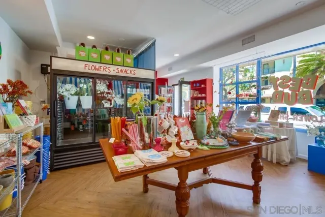 a bathroom with a toilet a sink and a mirror