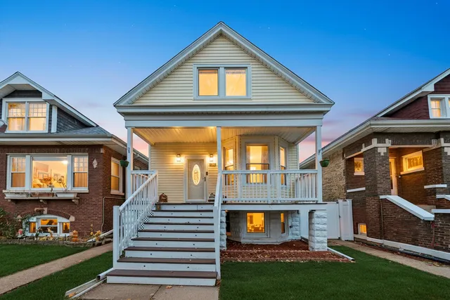 a view of a deck with chairs and wooden floor