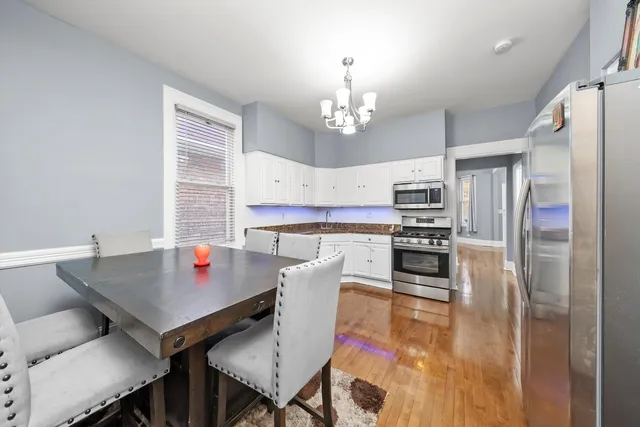 a bathroom with a toilet a sink and a shower